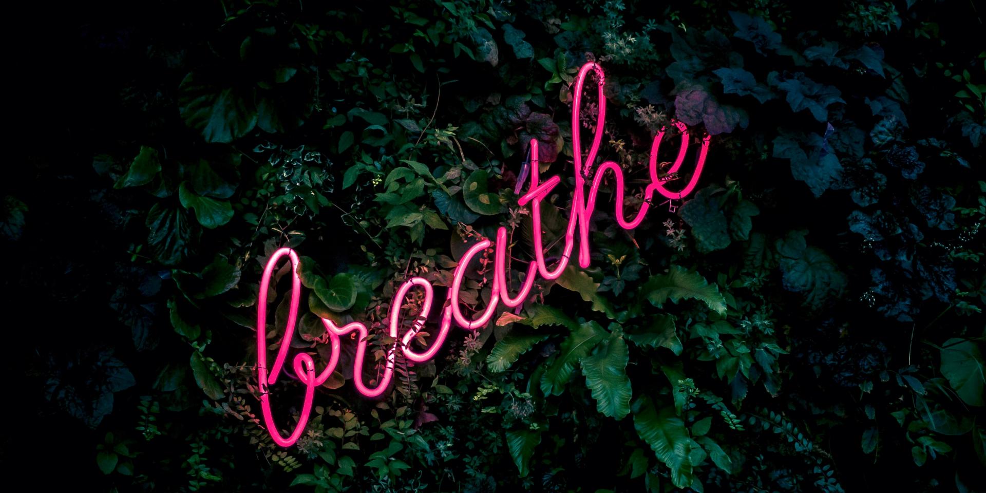 neon word breathe