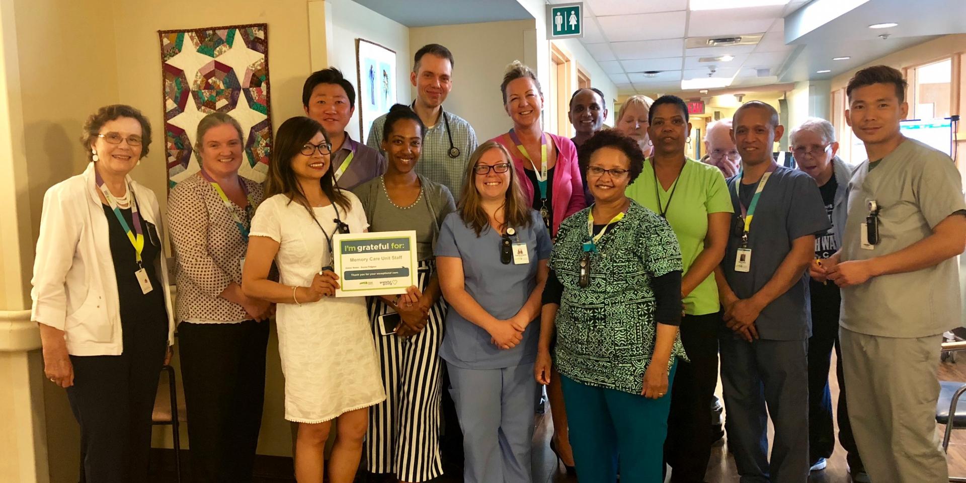 The Memory Care Unit team at Michael Garron Hospital accepting their Grateful Giving recognition