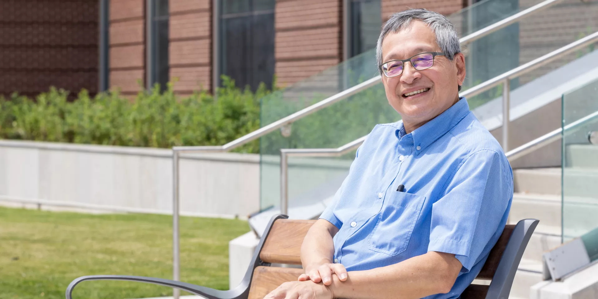 Photo of Dr. Leung smiling outside
