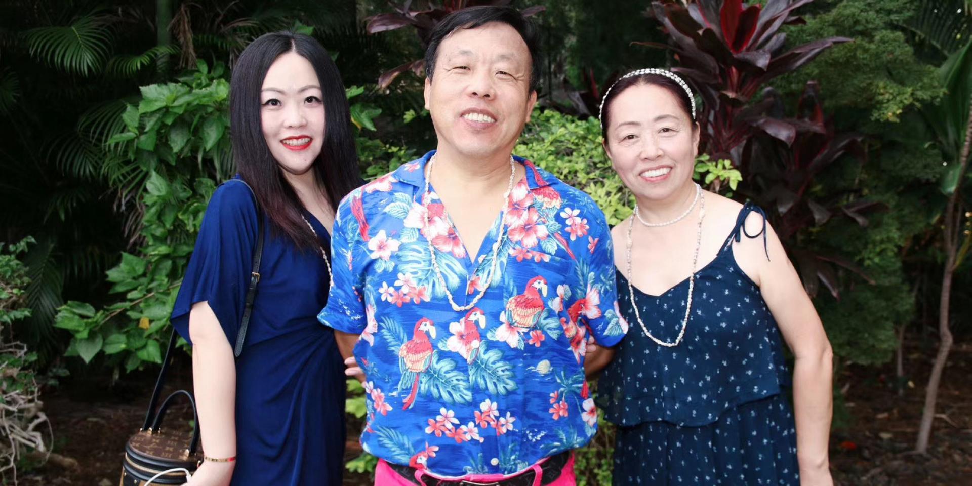 Julia Xu with her parents Zengqi Xu and Aibo Ding.