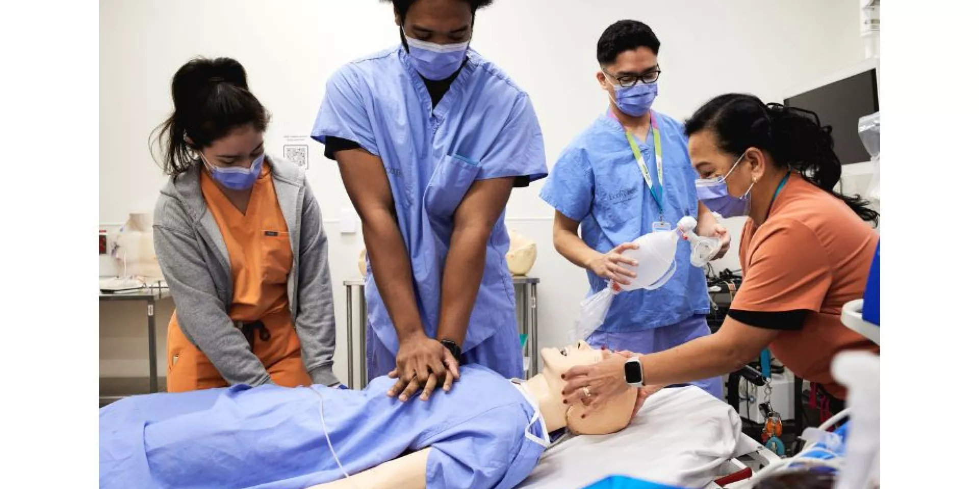 Practising a code blue scenario in the Rands Family Simulation Centre: Emma Kelly, RPN; Alexander Smith, RPN; Yuri Suico, Clinical Resource Lead, ED; and Sandra Millares, RN