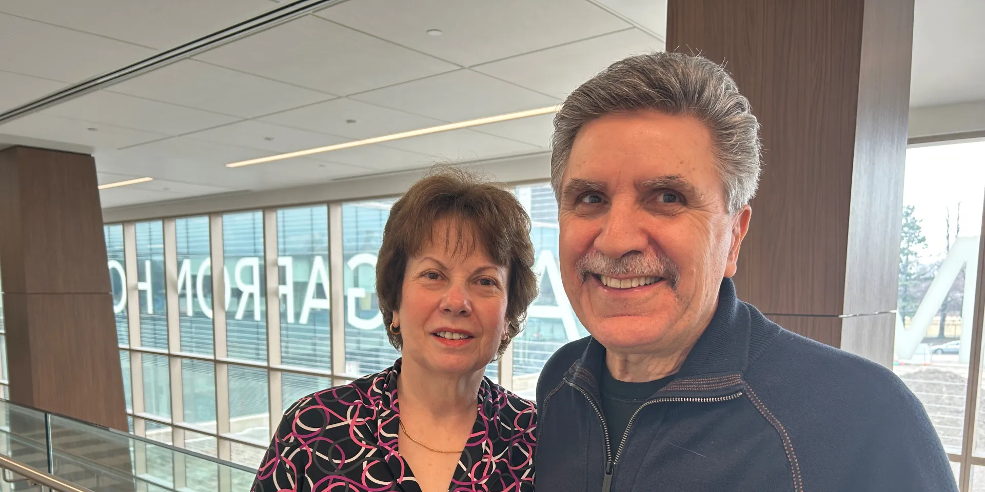 Frank Tulipano and Joanne Neglia posed in the hallway of the hospital