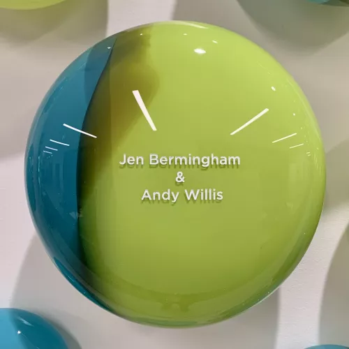 Blue and green 7" orb engraved with Jennifer Berhmingham and Andy Willis Blue and green handblown glass orb engraved with the names Jennifer Bermingham and Andy Willis