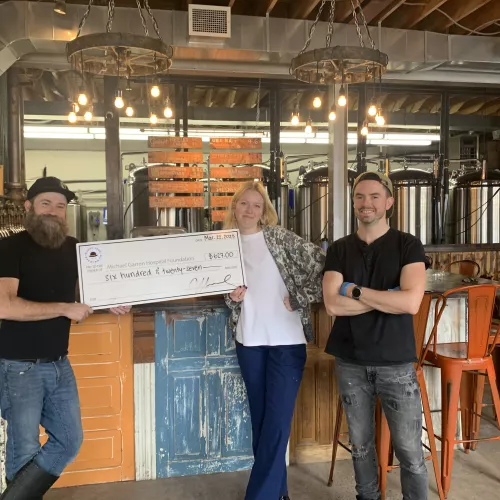 Muddy York cheque presentation photo at Muddy York Brewery