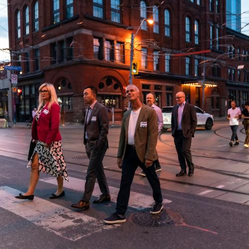 Crossing Queen Street in front of the Broadview Hotel