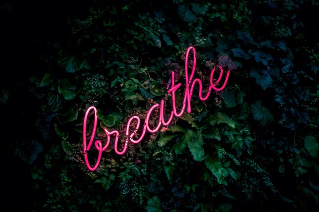 neon word breathe
