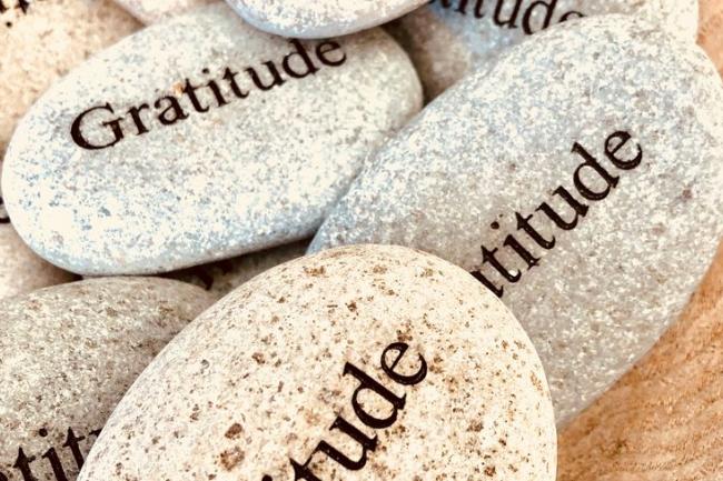 pebbles with word gratitude on them