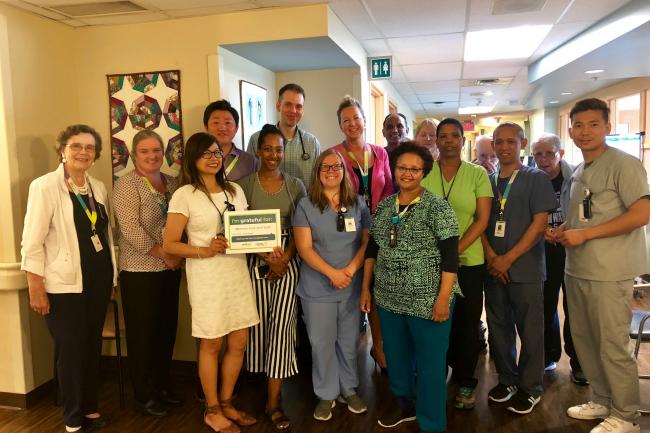 The Memory Care Unit team at Michael Garron Hospital accepting their Grateful Giving recognition
