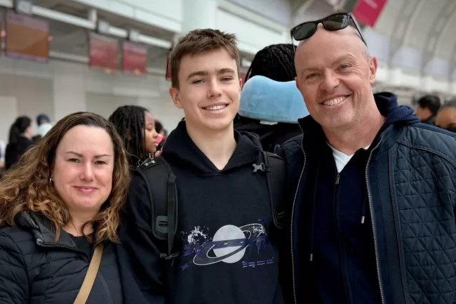 Chris Dulny with his son and wife in an airport