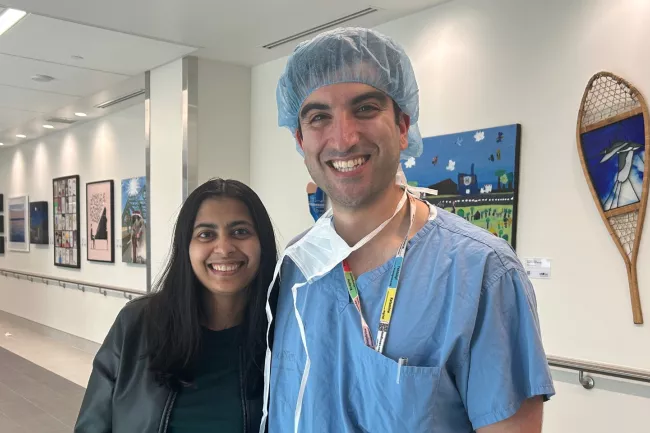 Urooj Siddiqui and anesthesiologist Dr. Joobin Sattar smiling in the hospital