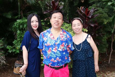 Julia Xu with her parents Zengqi Xu and Aibo Ding.