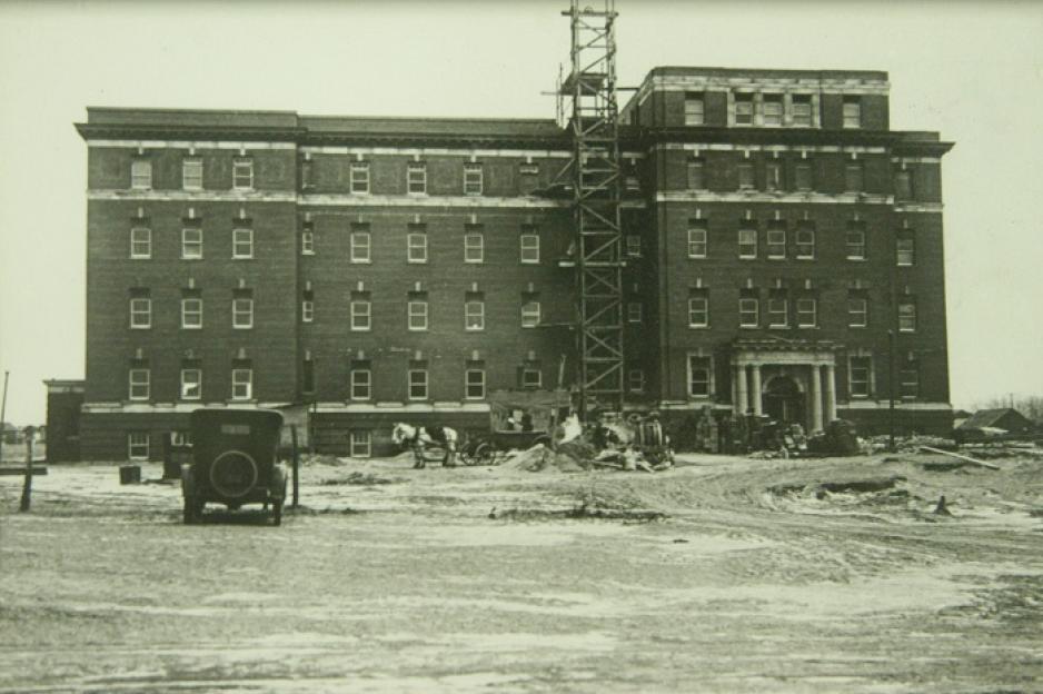 front building view of construction on hospital D-wing in January 1929  