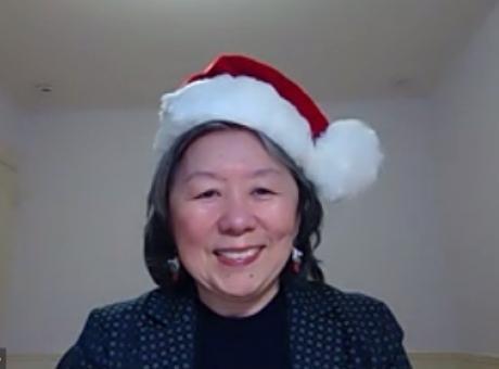 woman wearing Santa hat