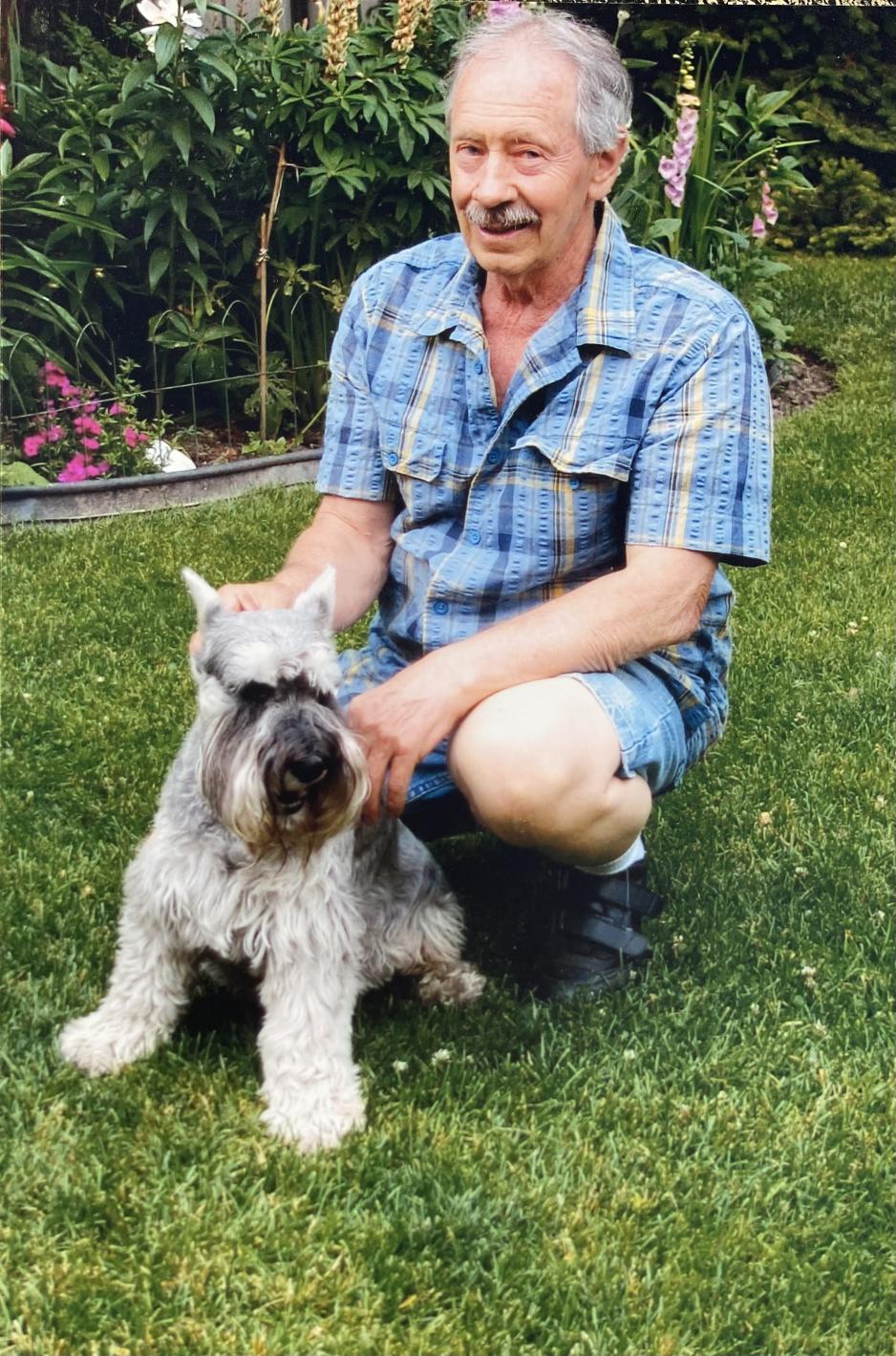 Ed and his best bud, a small grey dog named Joey.